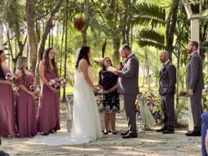 A couple eloping in Miami in a beautiful tropical garden